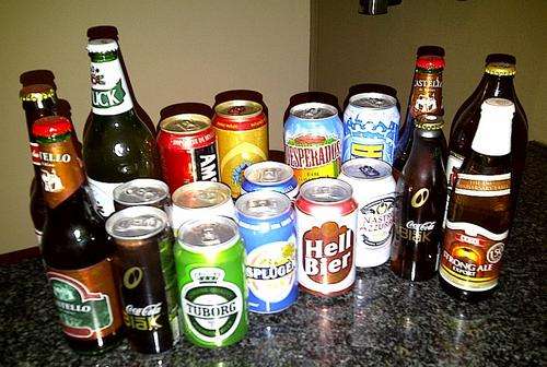 Collection of 18 international imported beers & Coke Blak