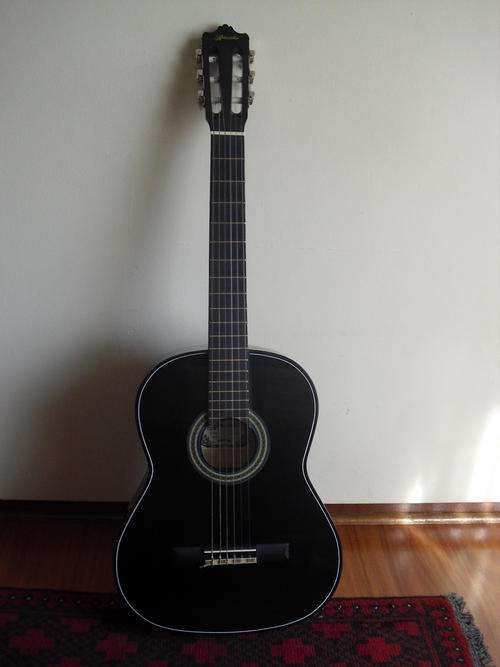 Black acoustic guitar