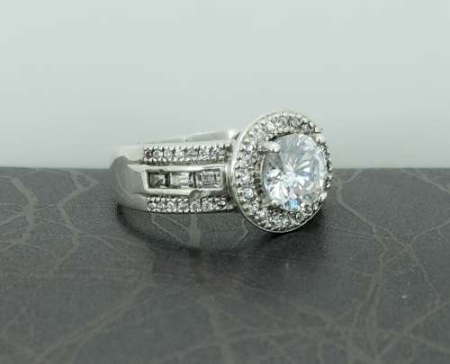 Solid 925 Silver Designer Engagement Ring, as per pictures posted.