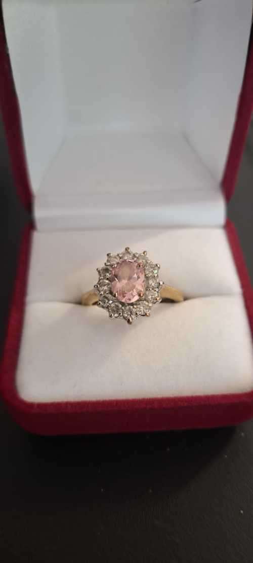 7ct Gold Ring with a 2ct Morganite, surrounded by 13 cz