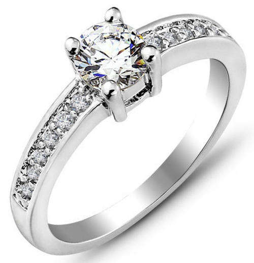 Great 0.58 Carat Cr. Diamond Solitaire with Accents Engagement Ring