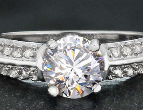 Sparkling 2.00 Carat Cr. Diamond Solitaire with Accents Engagement Ring