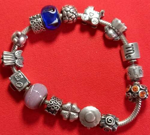 pandora braclet and charms  .925 silver