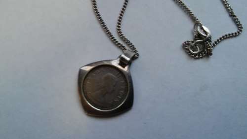 1953 silver Tickey and chain