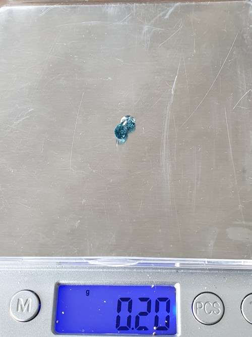 Pair blue treated natural sparkling diamonds total 0.95CTS