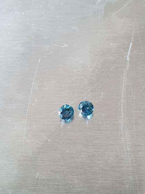 Pair blue treated natural sparkling diamonds total 0.95CTS