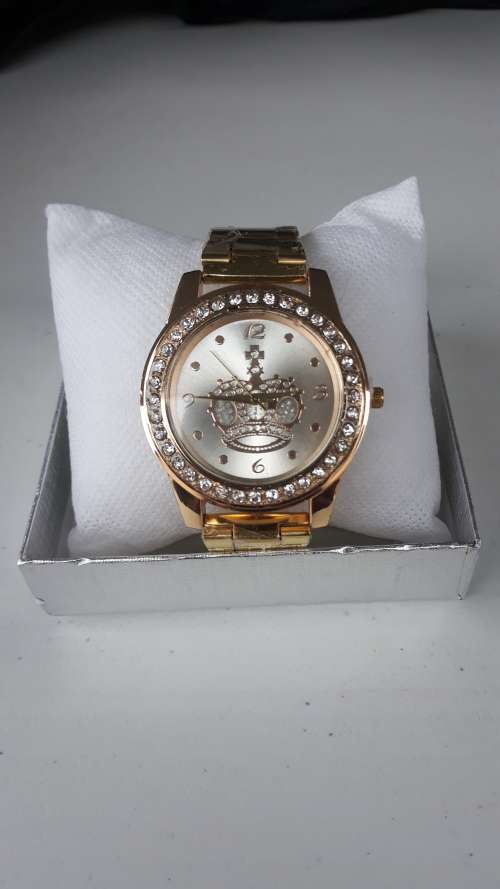 Ladies Gold Tone Crown Watch