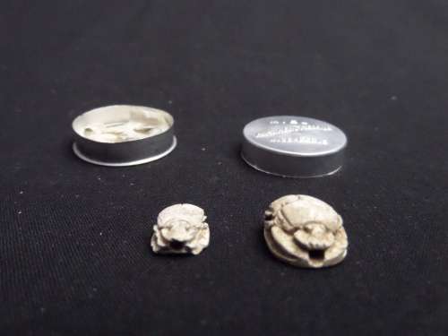 Egyptian Scarabs Amulet (Goodluck Charms with a message to congratulate a newborn)in Paris holder