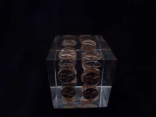 Interesting Paper Weight with United States of America One Cents in a Block Setting