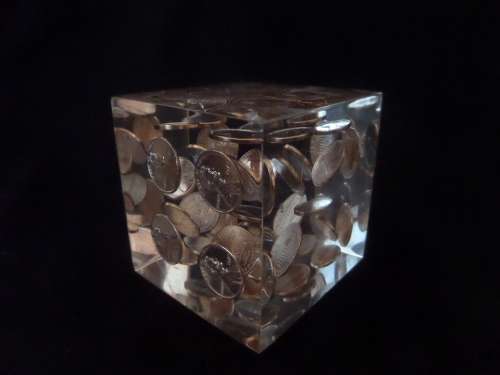 Interesting Paper Weight with United States of America One Cents in a Block Setting