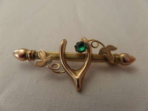 Antique 9 ct  Brooch - Wishbone on Scroll with leaves with green Stone