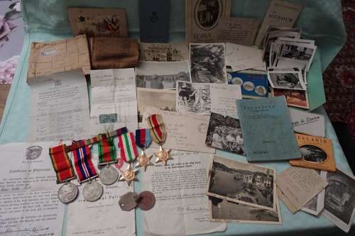 Set of WW2 Medals awarded to 108183 C.V. Smith and Lots of War Memorabilia Included