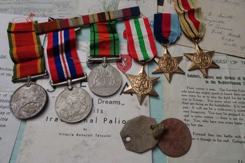 Set of WW2 Medals awarded to 108183 C.V. Smith and Lots of War Memorabilia Included