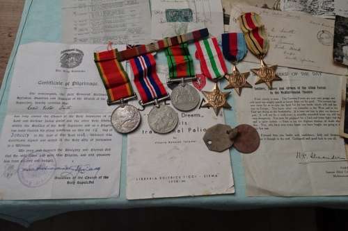Set of WW2 Medals awarded to 108183 C.V. Smith and Lots of War Memorabilia Included