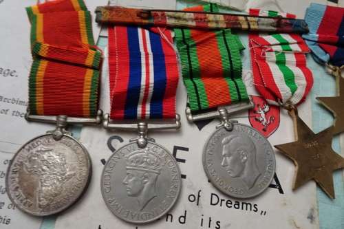 Set of WW2 Medals awarded to 108183 C.V. Smith and Lots of War Memorabilia Included