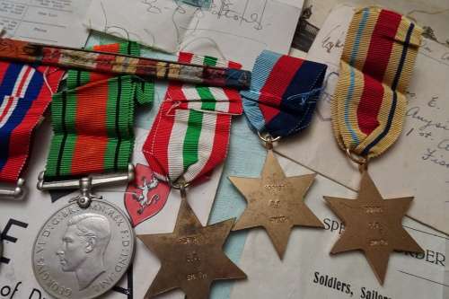 Set of WW2 Medals awarded to 108183 C.V. Smith and Lots of War Memorabilia Included