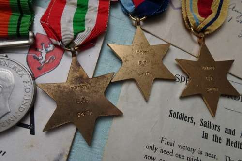 Set of WW2 Medals awarded to 108183 C.V. Smith and Lots of War Memorabilia Included