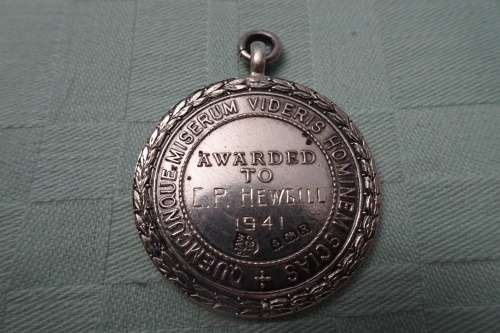 Hallmarked Silver Royal Life Saving Society award of Merit Medal in Pendant to C.P. Hewgill -