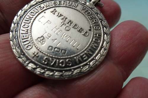 Hallmarked Silver Royal Life Saving Society award of Merit Medal in Pendant to C.P. Hewgill -