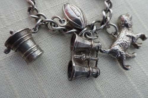 Stunning Silver Bracelet with 13 Lucky Charms (Please see Description) in Good Condition