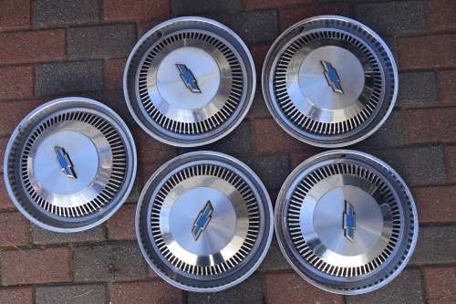 Set of Five Vintage Chevrolet Hubcaps in Good Condition  --  37 Wide