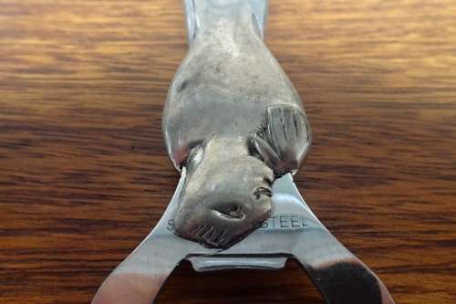 Unusual Carrol Boyes (1954 - 2019) Pewter and Stainless Steel Bottle Opener - Man Figure