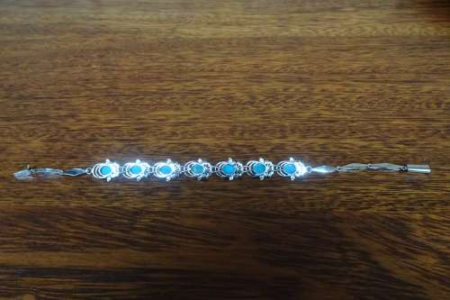 Superb Sterling Silver Linked Chain Bracelet With Turquoise Stones and Ornate Surround 9.3 g