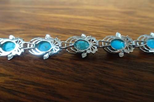 Superb Sterling Silver Linked Chain Bracelet With Turquoise Stones and Ornate Surround 9.3 g