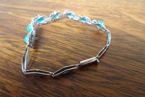 Superb Sterling Silver Linked Chain Bracelet With Turquoise Stones and Ornate Surround 9.3 g