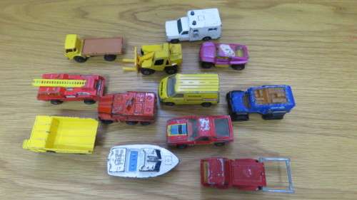 Collection of 12 Vintage Matchbox Die Cast Cars. See Description For Details.