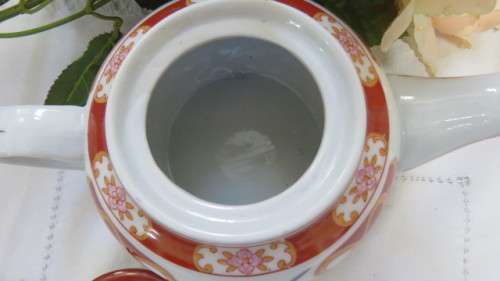 Beautiful Floral/Bird Round Porcelain Teapot With Gold Trim. Made in China H: 10 cm