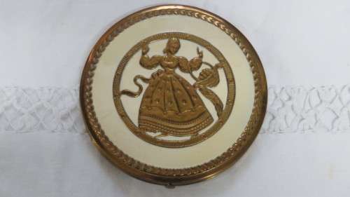 Pretty Vintage Gold Metal and Cream Dancing Lady With Basket Round Powder Compact D: 10 cm