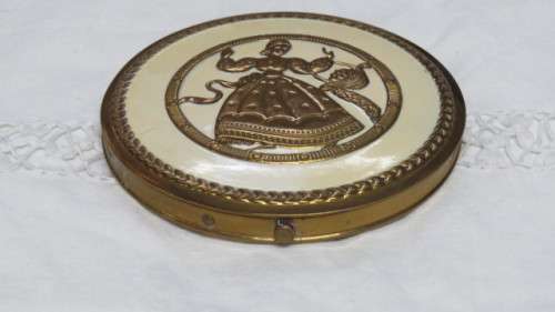 Pretty Vintage Gold Metal and Cream Dancing Lady With Basket Round Powder Compact D: 10 cm