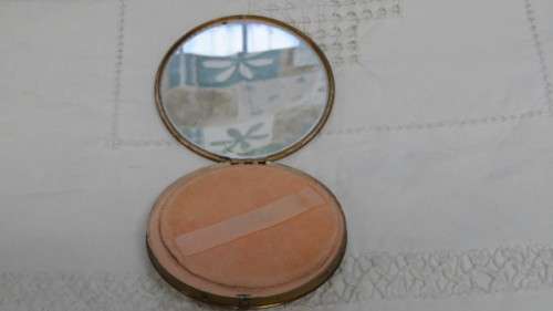 Pretty Vintage Gold Metal and Cream Dancing Lady With Basket Round Powder Compact D: 10 cm