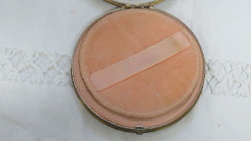 Pretty Vintage Gold Metal and Cream Dancing Lady With Basket Round Powder Compact D: 10 cm