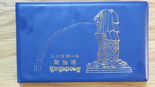 Singapore and Malaysia Uncirculated Coin and Stamp Set in Plastic Wallet Details in Description