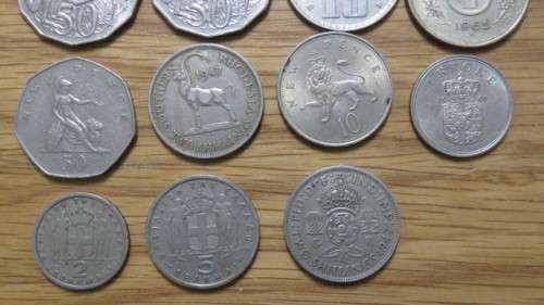 Collection of Fifteen International Coins Details in Description