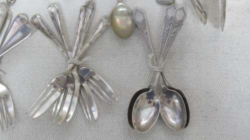 Collection of Thirty Three Silver Plated Teaspoons, Forks, Serving Spoons Details in Description