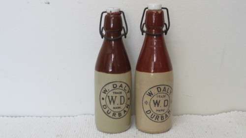 Two Vintage W. Daly Durban Stoneware Ginger Beer Bottles With Stoppers L: 23 cm