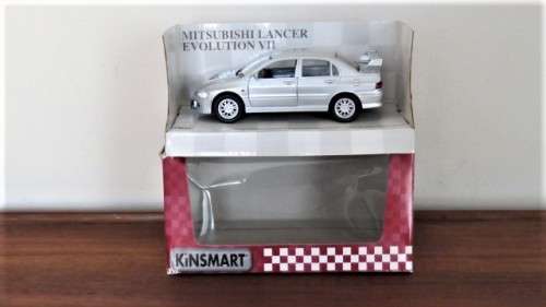 Boxed Kinsmart Die Cast Mitsubishi Lancer Evolution VII With Pull Back Action #KT5052 1:36 13 cm