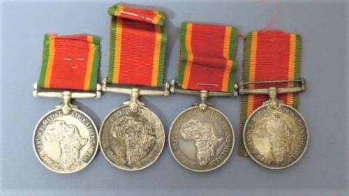 Four WW II Silver Africa Service Medals Issued to Various People Details in Description 136.9 g
