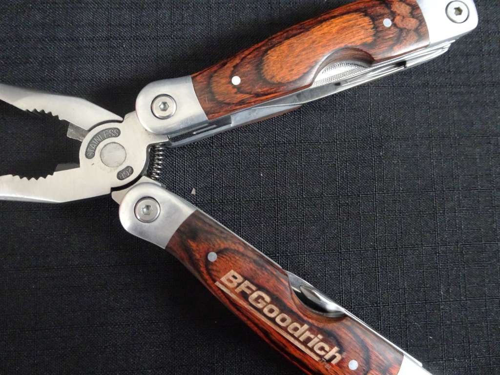 BFGoodrich Stainless Steel Wood Handle Multi Tool with Bits And Bag- See My Description