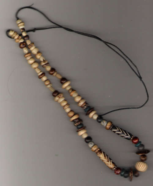 Ethnic necklace with bone, wood and semi-precious beads