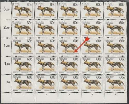 RSA CAPE HUNTING DOG 1993 CORNER BLOCK OF (X25) WITH VARIETY "LATIN OVERPRINT" ON ONE STAMP. UMM.