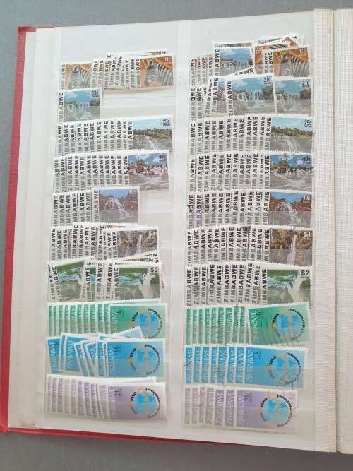 OLD DEALER`S ALBUM WITH ZIMBABWE MANY DUPLICATES ETC. BIG CV. AS PER PHOTOS. NB: PLS READ BELOW!!