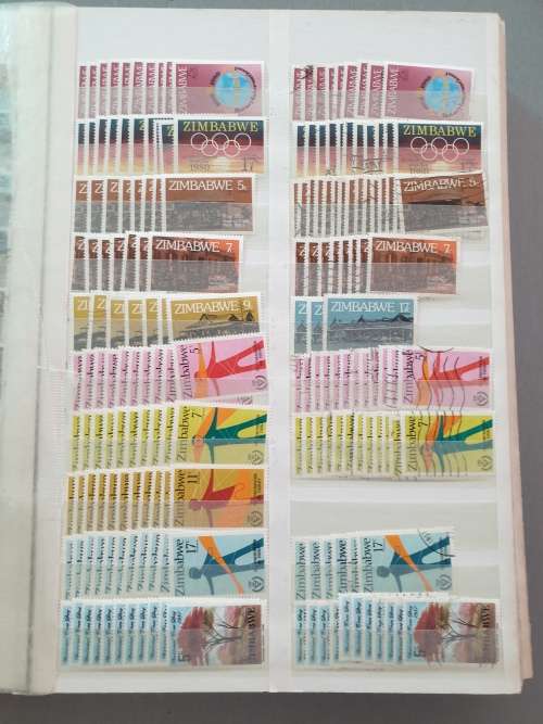 OLD DEALER`S ALBUM WITH ZIMBABWE MANY DUPLICATES ETC. BIG CV. AS PER PHOTOS. NB: PLS READ BELOW!!