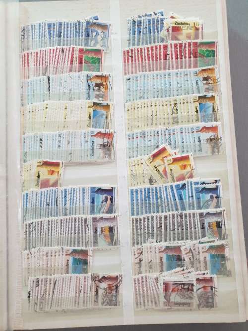 OLD DEALER`S ALBUM WITH ZIMBABWE MANY DUPLICATES ETC. BIG CV. AS PER PHOTOS. NB: PLS READ BELOW!!