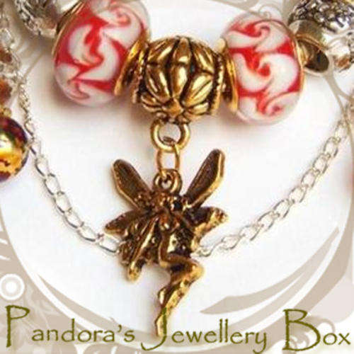 Gold Antiqued Fairy Charm