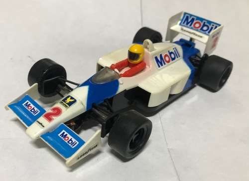 SCX McLaren MP4/4 in blue and white ONE RAND AUCTION