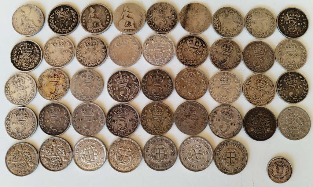 Britania / Great Britain coin lot in album (now minus the bronze pennies)